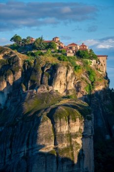 Great Meteoron Monastery perched on a cliff in famous greek tourist destination Meteora in Greece on sunrise. Monasteries of Meteora, Greece