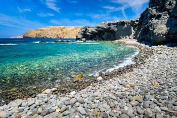 Papafragas beach with crystal clear turquoise water and tunnel rock formations in Milos island, Greece. Papafragas beach in Milos island, Greece