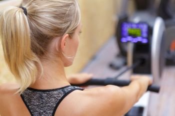 a woman on rowing machine