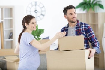couple expecting baby moving into new property
