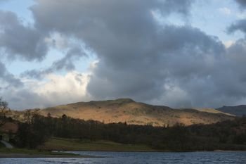 Beautiful landscape image of countryside around Rydal Water in UK Lake District during Spring sunrise