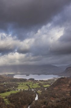 Beautiful landscape image of the view from Castle Crag towards Derwentwater, Keswick, Skiddaw, Blencathra and Walla Crag in the Lake District