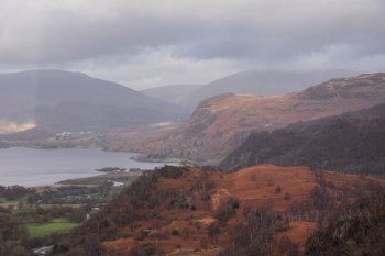 Beautiful landscape image of the view from Castle Crag towards Derwentwater, Keswick, Skiddaw, Blencathra and Walla Crag in the Lake District