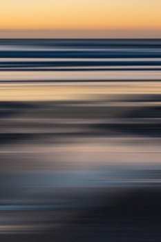 Abstract landscape blur background image of sunset over the ocean