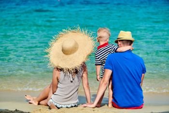 Family on beach, Sithonia, Greece