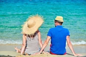 Couple on beach, Sithonia, Greece