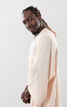 portrait of  handsome african black man in traditional islamin sudan fashion clothes