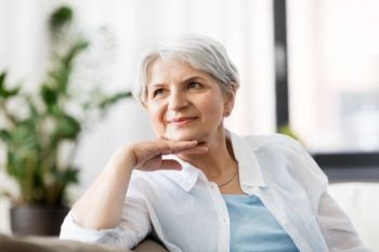 mature age and people concept - portrait of happy senior woman laughing. portrait of happy senior woman laughing