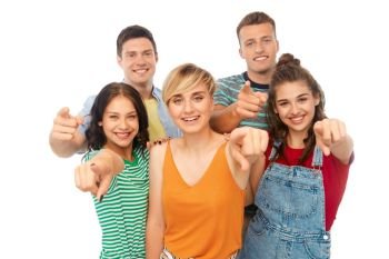 friendship and people concept - group of happy smiling friends pointing at you over white background. friends pointing at you over white background