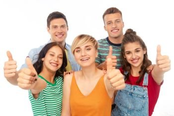 friendship and people concept - group of happy smiling friends showing thumbs up over white background. happy friends showing thumbs up