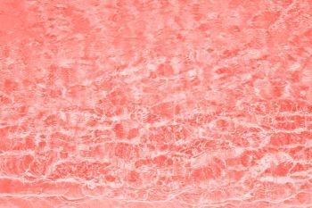 design trends concept - abstract water ripple background in color of the year2019 living coral. abstract living coral color background