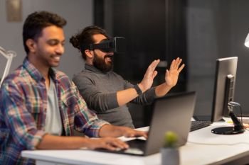 deadline, augmented reality and technology concept - creative man with virtual headset or 3d glasses at office. creative man in virtual reality headset at office