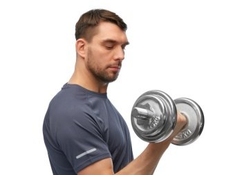fitness, sport and bodybuilding concept - man exercising with dumbbells over white background. man exercising with dumbbells