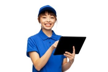 profession, job and people concept - happy smiling delivery woman in blue uniform with tablet pc computer over white background. happy smiling delivery woman with tablet computer