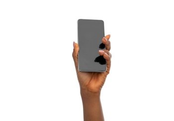 technology and people concept - close up of female hand holding smartphone over white background. close up of hand holding smartphone