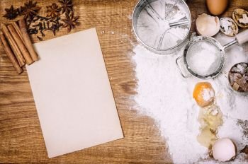 Baking tools and ingredients. Food background. Vintage style toned picture