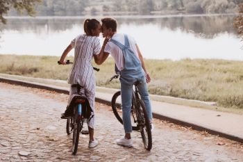 Romantic couple riding bicycles on a date