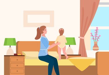Young woman with a daughter sitting on couch at home. Small girl walks on the bed in living room interior. Mother on maternity leave caring for a child, playing teaches a child to walk. Happy family. Young woman with a daughter sitting on couch. Small girl walks on the bed in living room interior