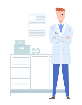 Doctor in a white coat with a badge works in the lab. Redhead therapist in medical office. Male character smiles and standes with folded arms on his chest. Working day and pastime in medical facility. A doctor in a white coat with a badge works in the lab. Redhead therapist in medical office