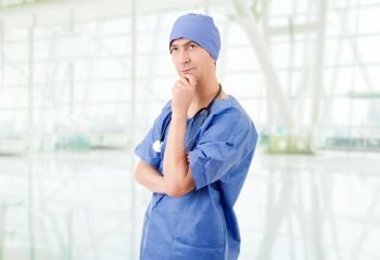 male doctor thinking at the hospital