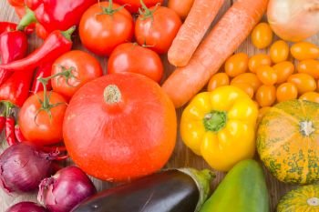 fresh colorful vegetables   - pumpkin, tomatoes, onion and eggplant