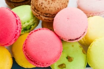 pile of french multicolored  macaroons close up