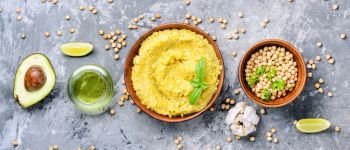Healthy homemade creamy hummus of chickpeas. Classic hummus with on the plate