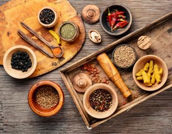 Big set Indian spices and herbs.Food and cuisine ingredients.Spices on a wooden board. Mix indian spices