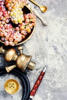 Turkish shisha hookah with aroma grapes for relax.Grapes shisha. Hookah with aroma grapes