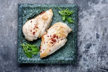 Baked chicken breast stuffed with spinach.Grilled chicken breast. Grilled healthy chicken breasts