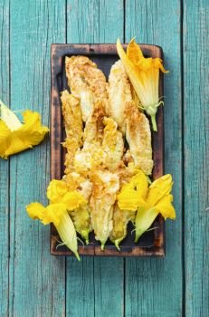 Stuffed zucchini or courgette flowers.Baked zucchini or courgette flowers with cheese.Fried zucchini flowers. Roasted zucchini flowers