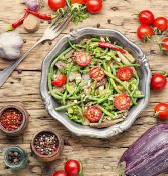 Spring vegetable salad.Salad with asparagus beans, tomato, eggplant and asparagus. Salad with asparagus beans