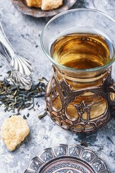 Eastern tea in traditional glasse.Eastern tea concept. Traditional arabic tea