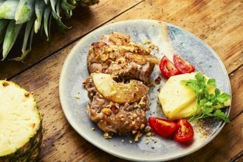 Slice pork meat baked with pineapple and cheese. Meat grilled with pineapple