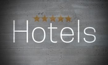 Hotels on concrete wall concept background.. Hotels on concrete wall concept background