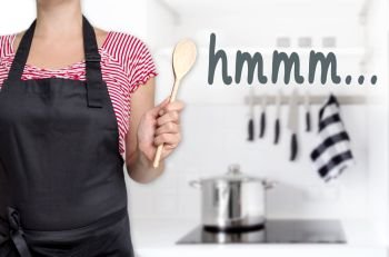 hmm cook holding wooden spoon background concept.. hmm cook holding wooden spoon background concept