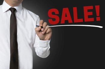 Sale is written by businessman background.. Sale is written by businessman background