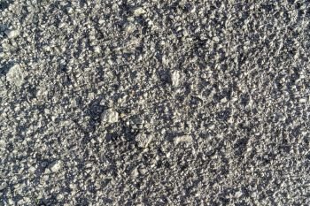 close up surface rough of asphalt, Seamless grey road with small rock, Texture Background.