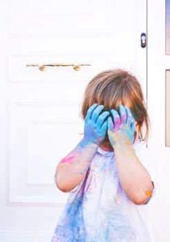 Little girl dirty of paint                               