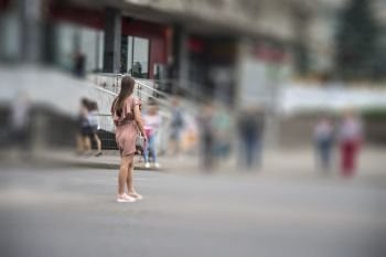 girl crosses the road at the pedestrian crossing Minsk