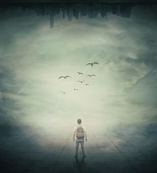 Surrealistic image with a man standing in a foggy street below a abstrat city