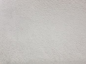Blank concrete wall, white color cement for texture abstract background. Weathered light grey grunge beton structure.