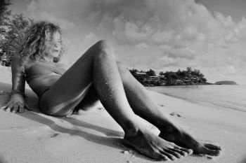 Girl legs beach vacation