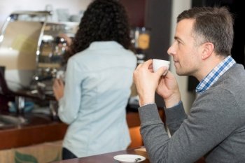 a couple having a coffee break