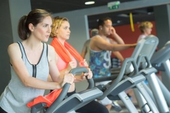 young women training on treadmills