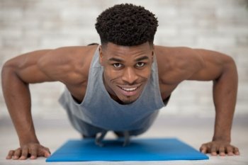 fitness model exercising push ups