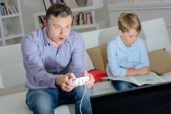 man busy with video game