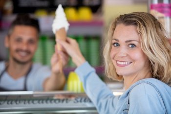 young woman buying ice cream