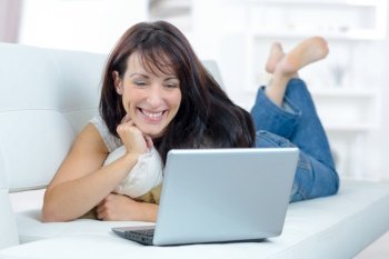 woman watching movie on laptop