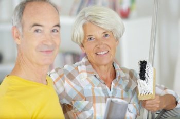 senior couple with painting brush